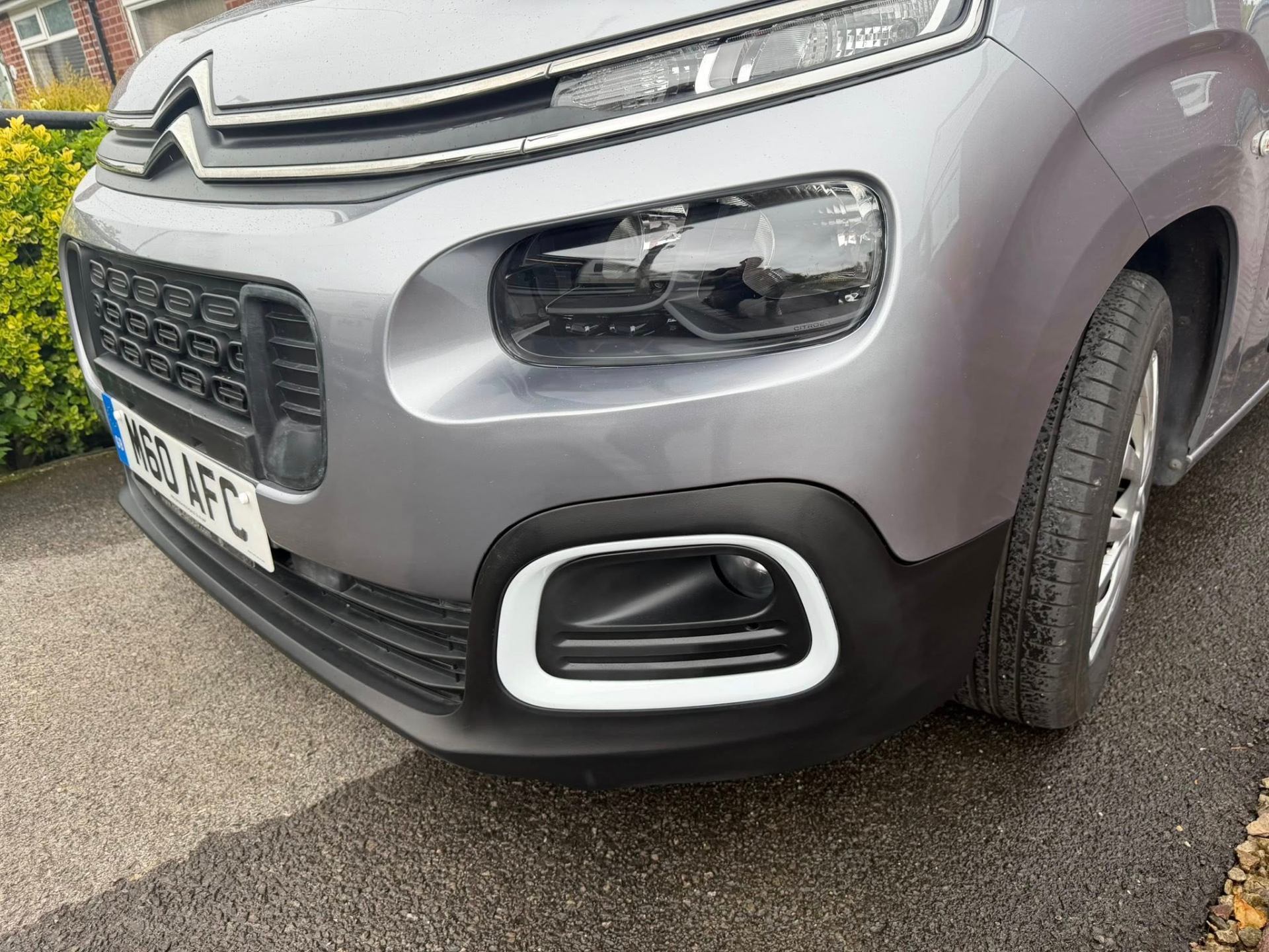 Scuffed bumper before repair