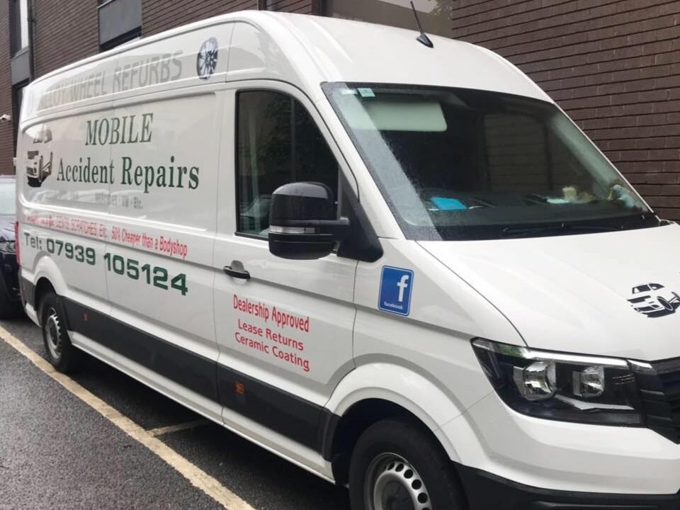 Mobile Accident Repairs Ltd service van with full company branding in Manchester