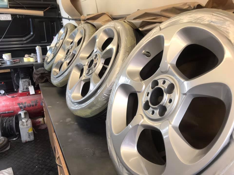 Set of alloy wheels before refurbishment and repainting by Mobile Accident Repairs Ltd Manchester